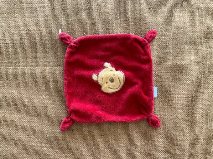 Doudou plat Winnie l'ourson rouge Disney d'occasion
