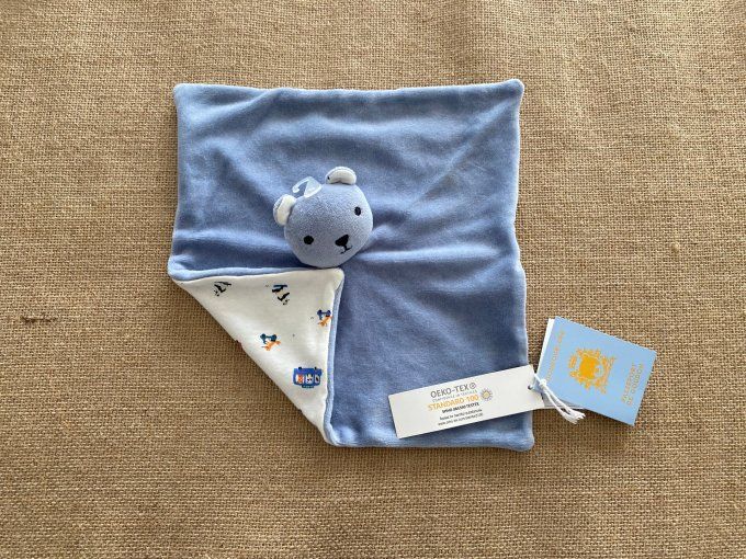 Doudou plat ours bleu imprimé de renards pandas bus Bout'chou - Article Neuf