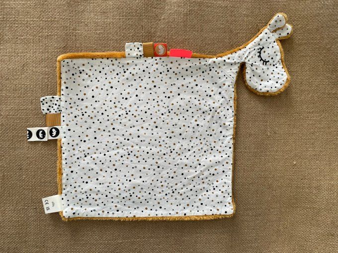 Doudou plat girafe raffi cuddle chiffon moutarde Done by Deer d'occasion