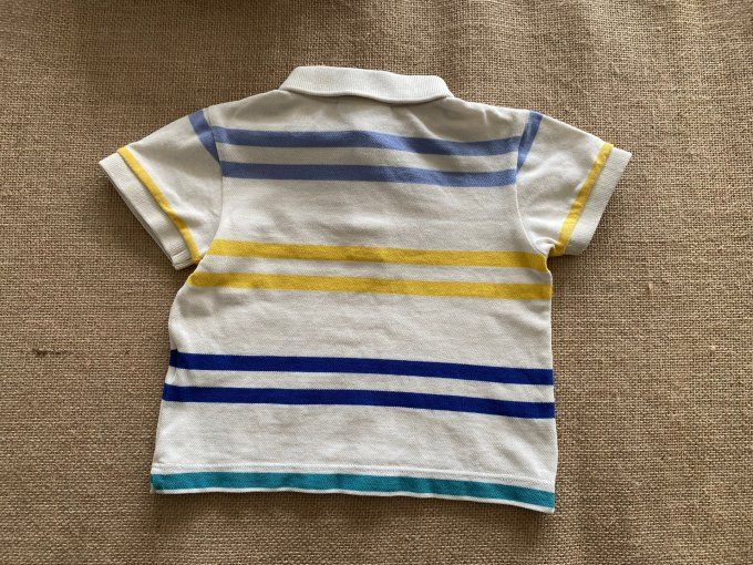 Polo beige rayé bleu et jaune Lacoste d'occasion
