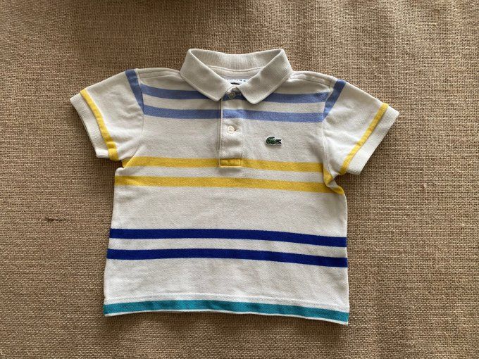 Polo beige rayé bleu et jaune Lacoste d'occasion