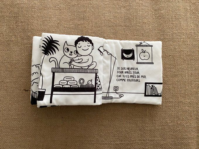 Livre en tissu noir et blanc Je suis heureux que tu sois là Laura Van Bouchout d'occasion