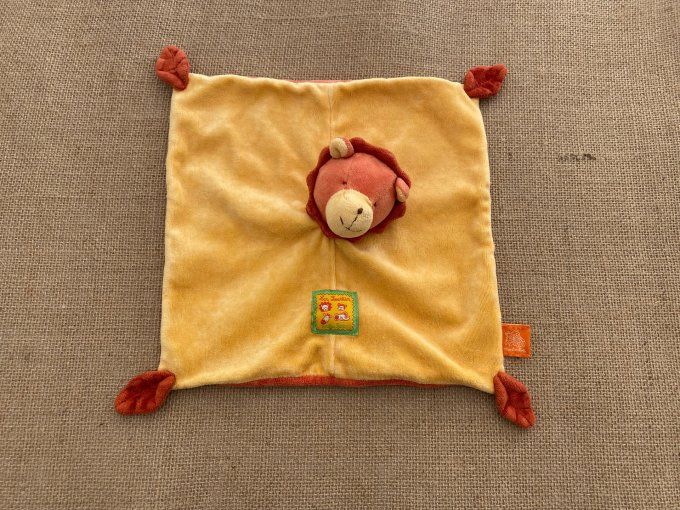 Doudou plat lion jaune orange Les Loustics Moulin Roty d'occasion