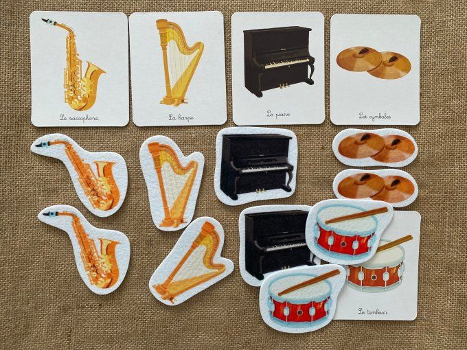 Jeu tout-petit Montessori mes instruments de musique en feutrine Nathan d'occasion