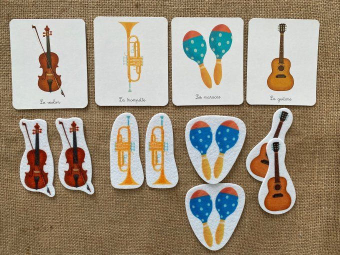 Jeu tout-petit Montessori mes instruments de musique en feutrine Nathan d'occasion