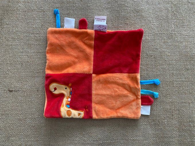 Doudou plat girafe orange rouge P'tit Basile d'occasion
