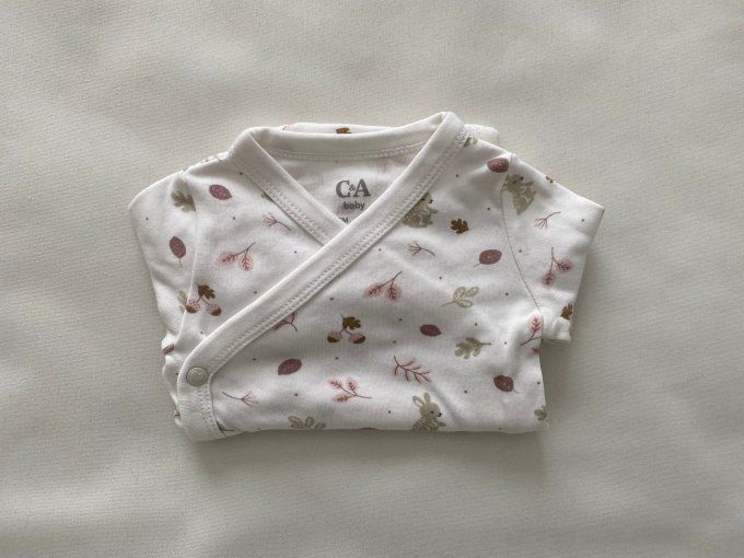 Body blanc motifs lapin feuilles C&A 0/1 mois 56 cm d'occasion