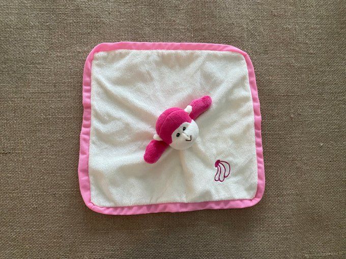 Doudou plat singe crème rose motif banane Zeeman d'occasion