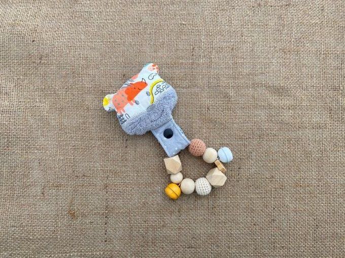 Doudou hochet chat perles bois d'occasion